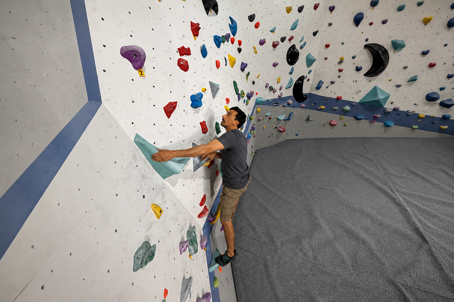 Climber on indoor wall at The West Climbing Center